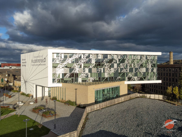 Barbara Hepworth Building at the University of Huddersfield beneath dramatic clouds