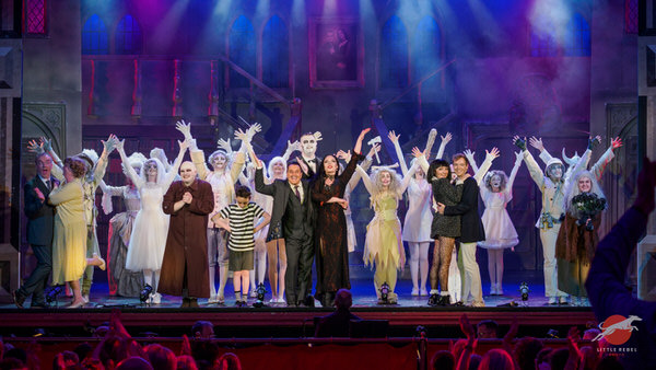 Cast taking their bows at the finale of Upstagers’ The Addams Family musical