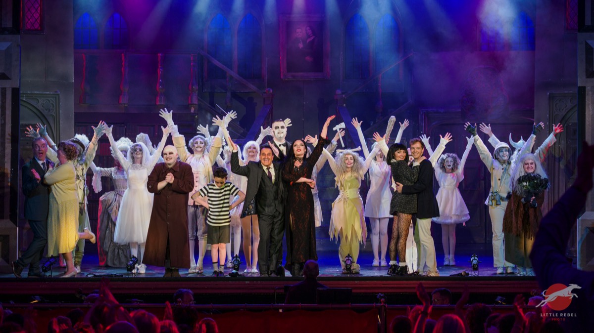 Cast taking their bows at the finale of Upstagers’ The Addams Family musical