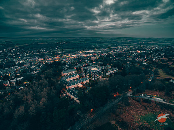Aerial twilight view of Wells House overlooking the lights of Ilkley
